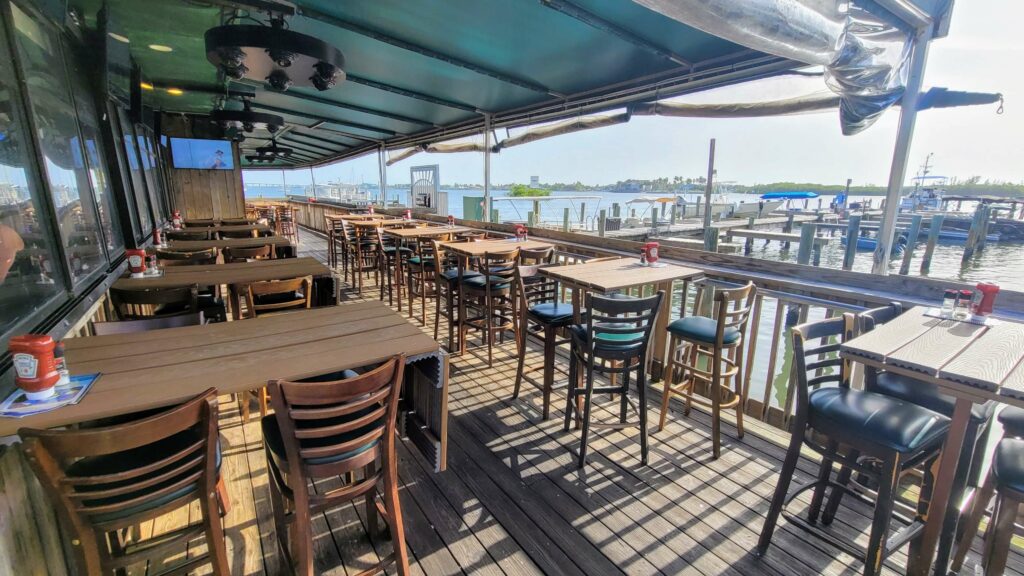 Outdoor dining patio near the boat dock at Riverside Cafe in Vero Beach Florida