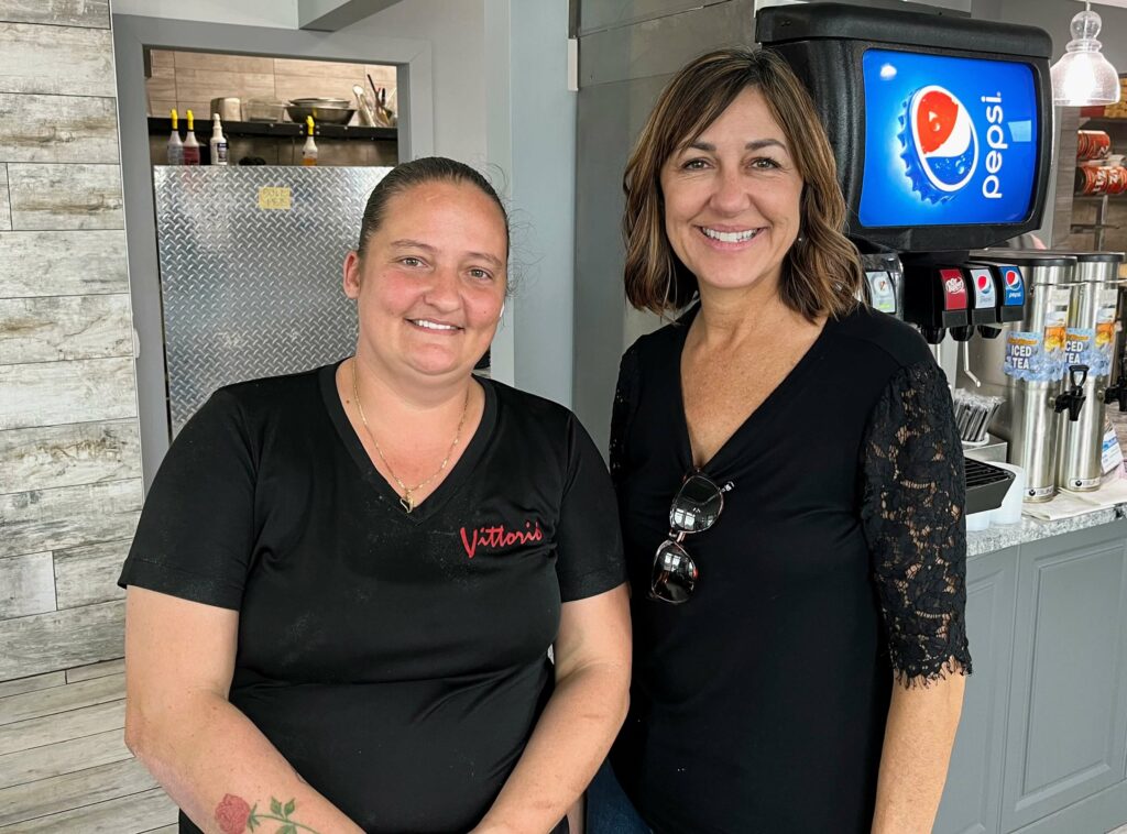 Vittorio's vero beach oslo road general manager Ashley Perkins with The Treasure Coast Foodie blogger, Lisa Hastings