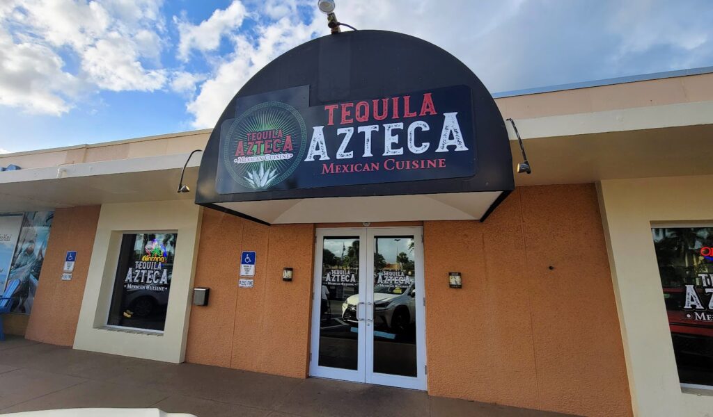 front entrance and sign above the door for tequila azteca mexican restaurant in vero beach florida