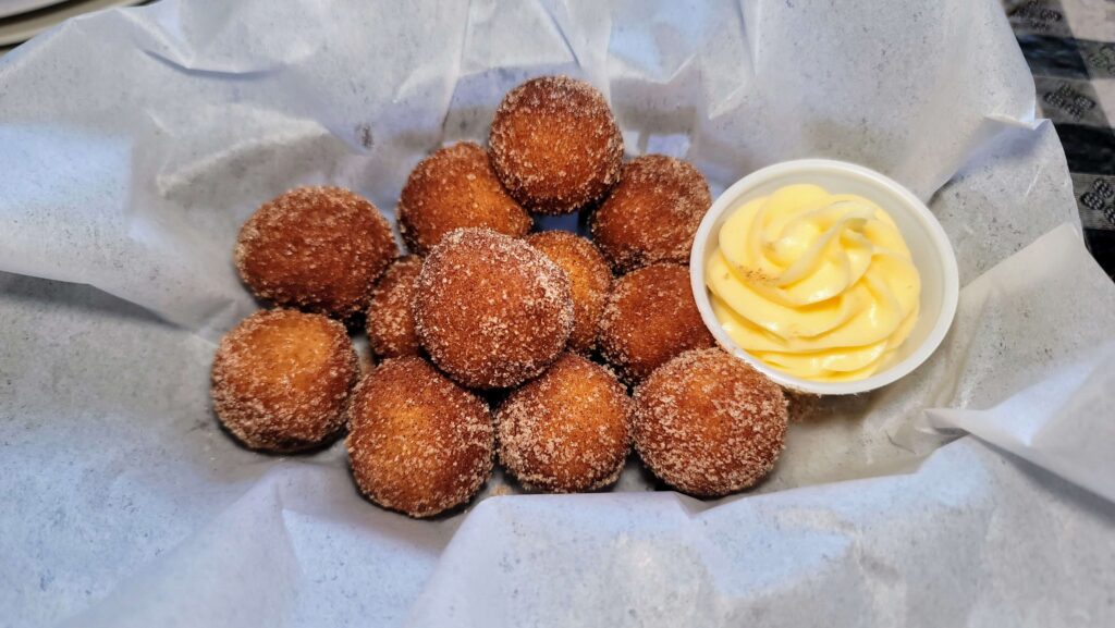 donut holes with a side of frosting from Baci Trattoria located in Downtown Vero Beach Florida