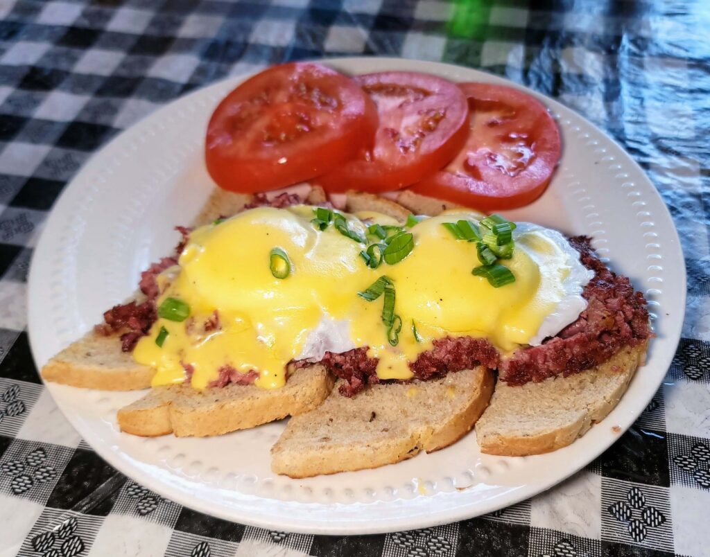 Corned Beef Hash Eggs Benedict from Baci Trattoria located in Downtown Vero Beach Florida