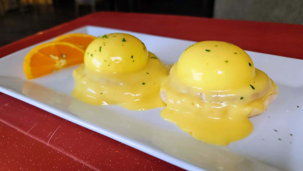 Classic eggs benedict as prepared by Waterfall restaurant located on 14th Ave in Vero Beach Florida