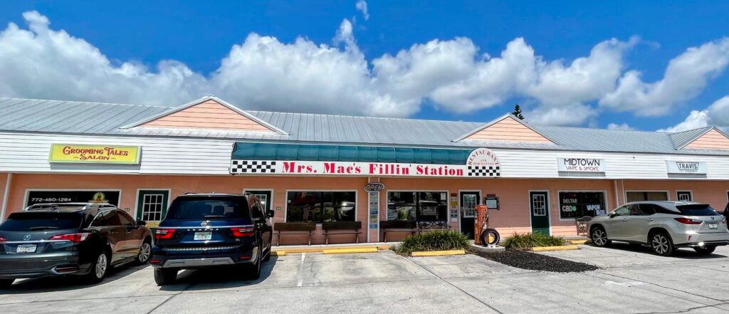 Front entrance and parking lot in front of Mrs Mac's Fillin Station restaurant located in Vero Beach Florida