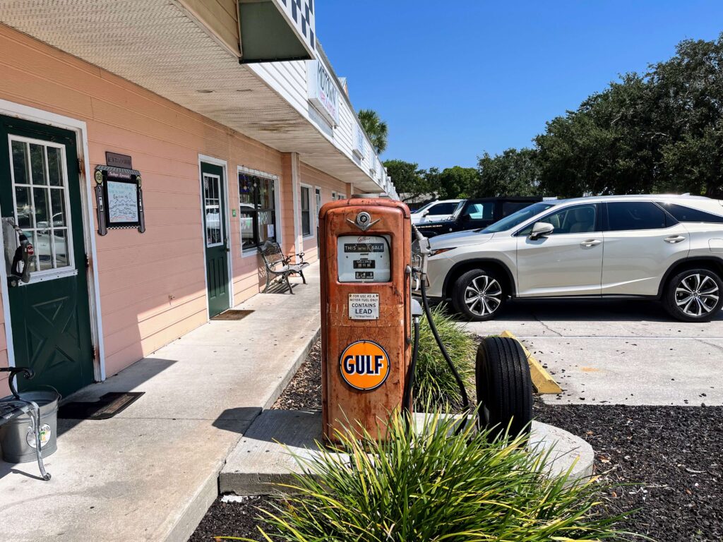 Vintage gas pump located outside the entrance of Mrs Mac's Fillin Station restaurant located in Vero Beach Florida