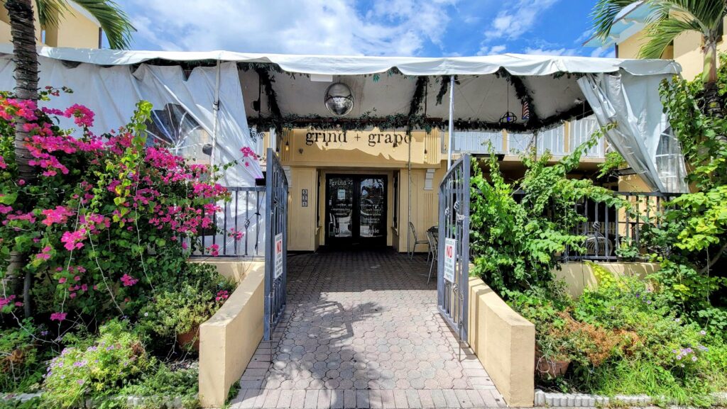 front entrance for Grind & Grape located on the island in vero beach florida