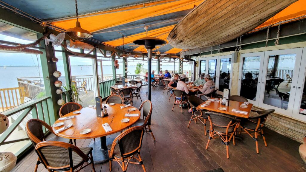 Outdoor dining patio at the Dolphin Bar & Shrimp House located in Jensen Beach, Florida