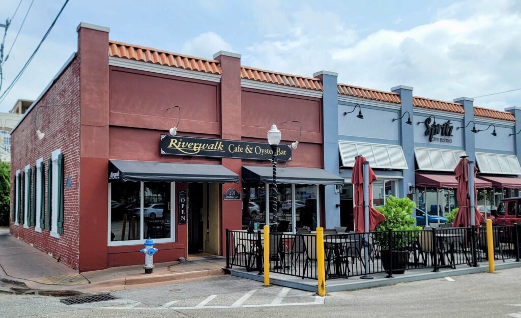 front entrance and outdoor dining patio for Riverwalk Cafe & Oyster Bar located in Stuart Florida