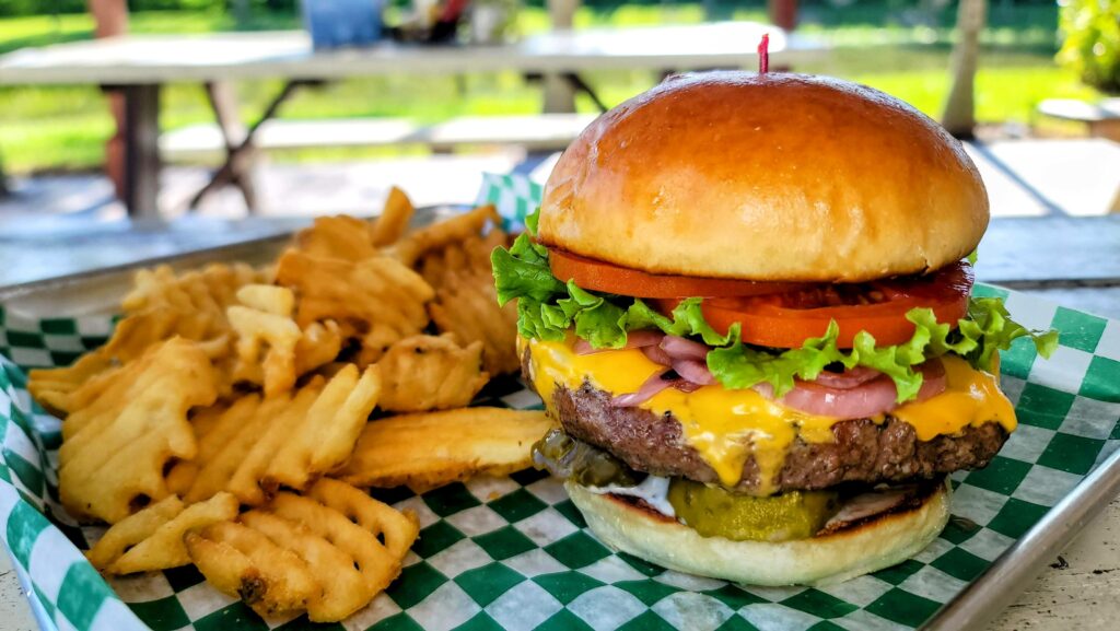 The Ultimate Classic Cheeseburger, the Treasure Coast Foodie's personal recipe that won 2nd Place People's Choice at the United Against Poverty's Burgers & Brews Competition in 2023, as prepared by The Grill restaurant at CW Willis Family Farms in Vero Beach Florida