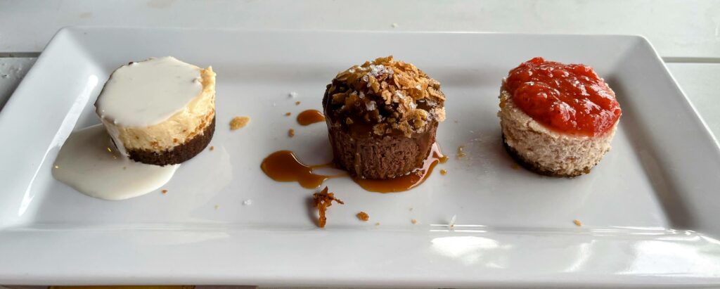 Trio of mini cheesecakes for dessert as served at Citrus Grillhouse located in Vero Beach florida