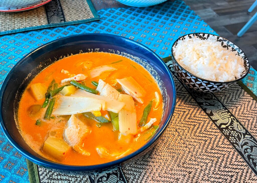 Red Curry with Rice and chicken as prepared by Thai Smile & Sushi located in Sebastian florida