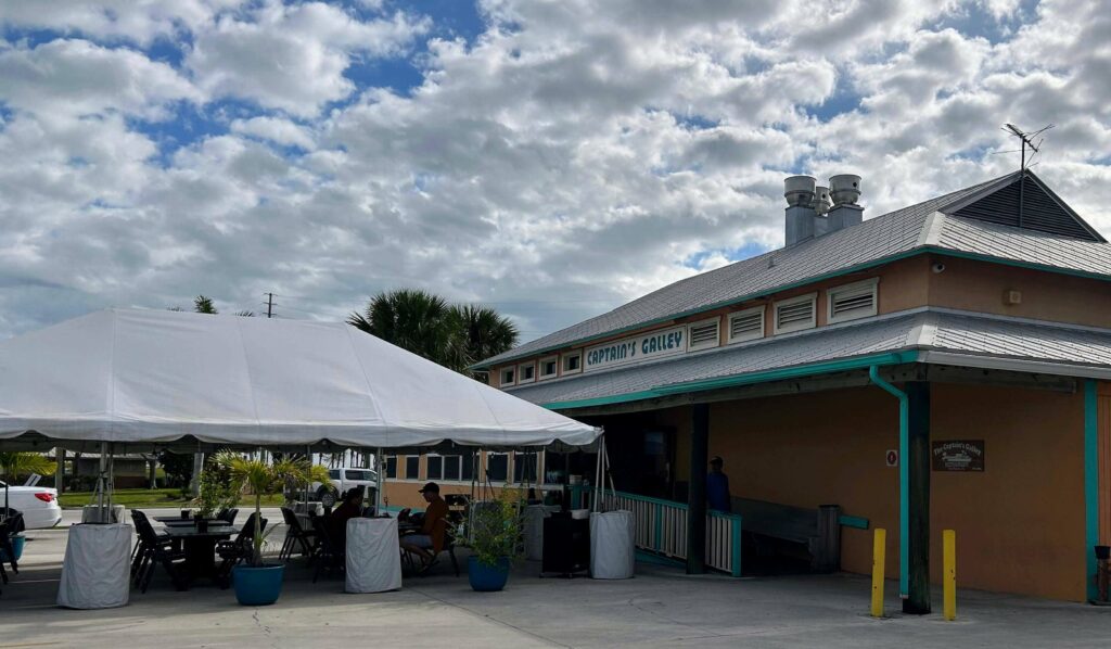 Outside view on a cloudy day of Captains Galley located in Fort Pierce Florida