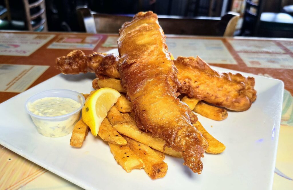 Fish and chips with french fries as prepared by Riverside Cafe in Vero Beach Florida