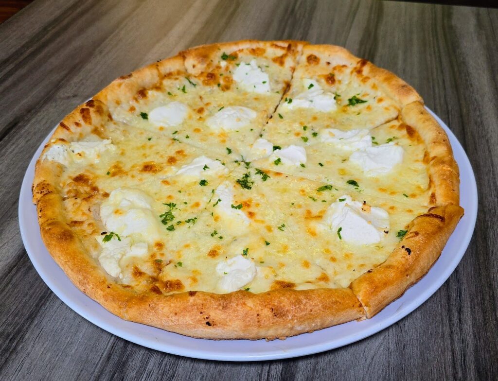 A white pizza pie as prepared by Giorgio's New York Pizzeria located in Vero Beach Florida