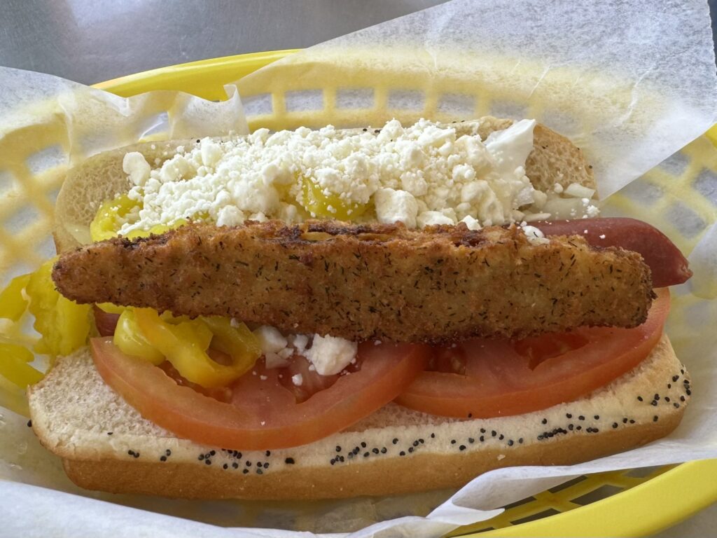 Great Greek: Feta cheese, tomato, onions, fried pickle, pepperoncini, and tzatziki as prepared by Mustard's Last Stand in Melbourne, Florida
