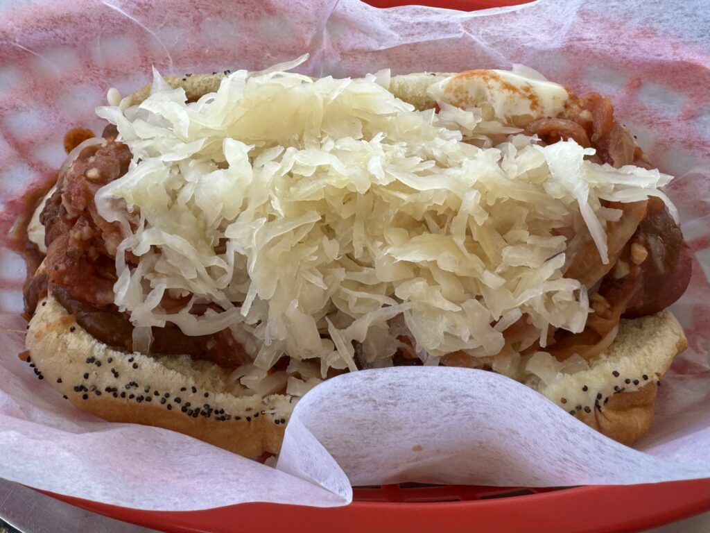 The Meathead: Polish sausage, New York onions, kraut, chili, and mayonnaise as prepared by Mustard's Last Stand in Melbourne, Florida