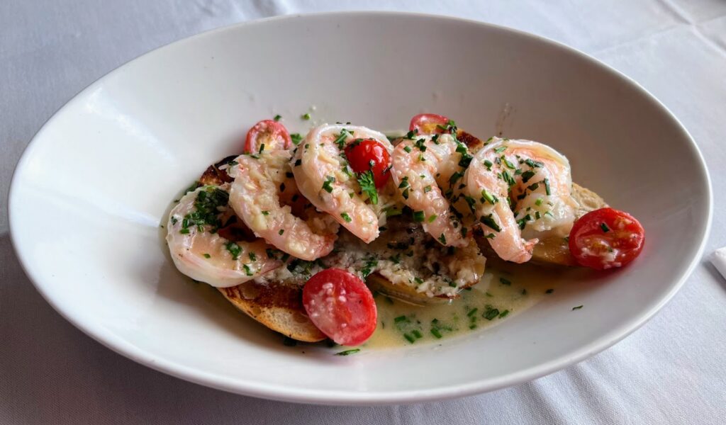 Venetian Shrimp Crostini as prepared by Cooper's Chop House & Seafood located in Royal Palm Pointe in Vero Beach Florida