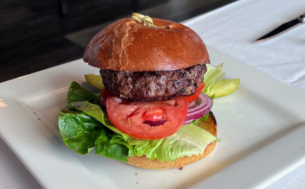 Cooper's Grilled Angus Beef Burger as prepared by Cooper's Chop House & Seafood located in Royal Palm Pointe in Vero Beach Florida